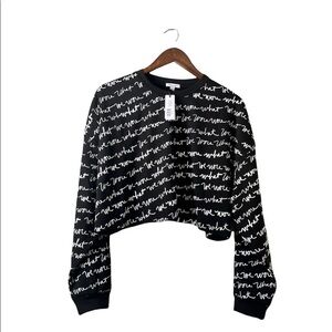 NWT WeWoreWhat black and white script long sleeve crew neck crop top raw hem L